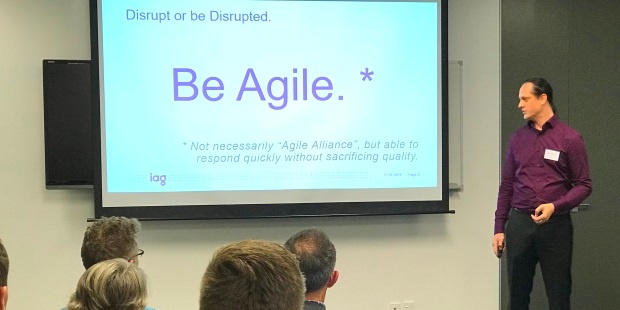 Daniel Scott-Raynsford, Continuous Delivery Practice Lead at IAG New Zealand, showing why they needed to 'be Agile'