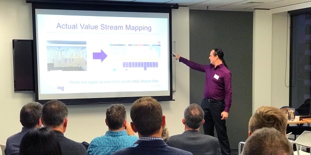 Daniel Scott-Raynsford, Continuous Delivery Practice Lead at IAG New Zealand, presents on their journey to the cloud at an Equinox IT hosted event