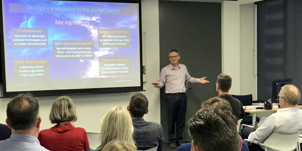 Equinox IT Principal Consultant Bill Ross presenting on DASA DevOps frameworks at an Equinox IT client event